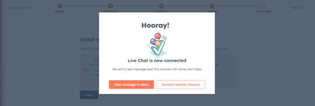 HubSpot chat widget setup complete confirmation with options to go to Inbox or connect another channel